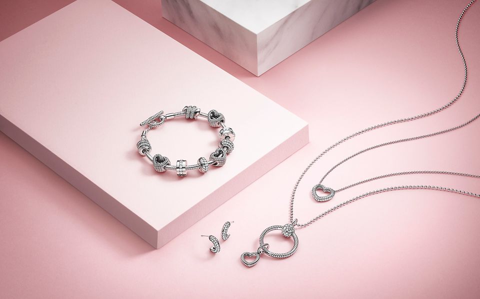 Snake chain pattern bracelet, earrings, charms and Pandora O Pendant