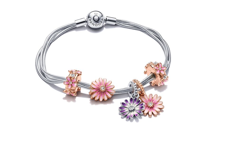 Pandora Moments bracelet with Pandora Garden pink and purple daisy charms.