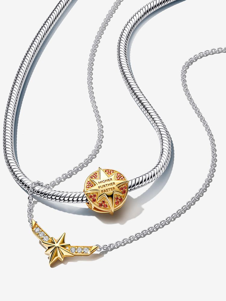 Image of 2 layered silver necklaces with two gold captain marvel charms