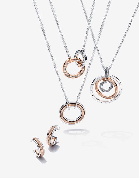 Image of 3 rose gold and silver signature necklaces and a pair of small hoops