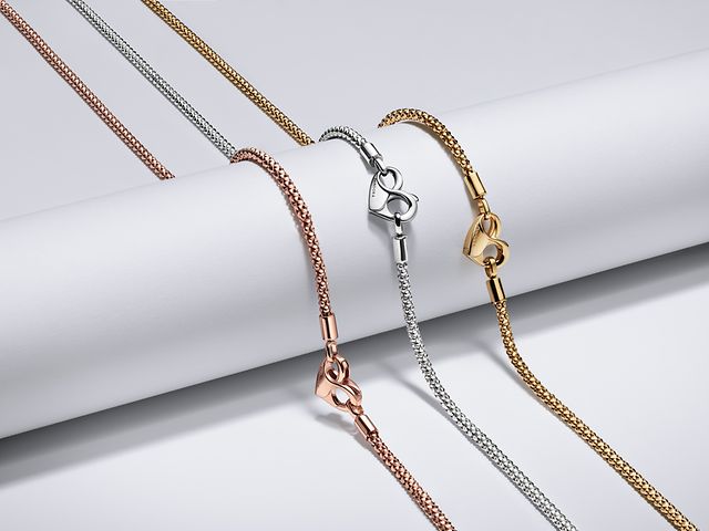 Image of 3 pandora moments studded chains which are silver, gold and rose gold