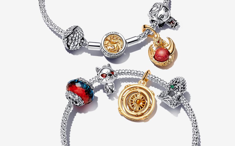 A close up of two bracelets, showcasing Game of Thrones x Pandora charms.
