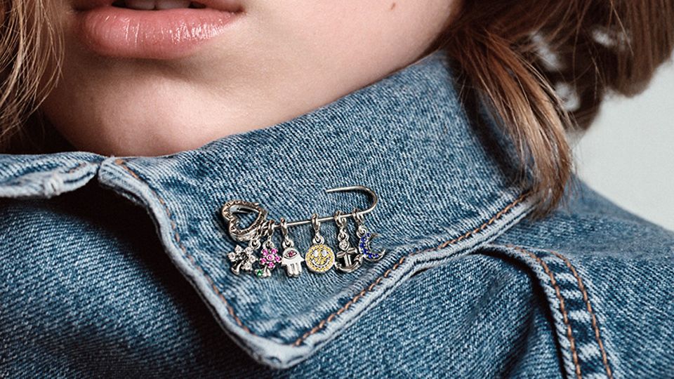 Pin your favourite charms anywhere with the Pandora Me brooch.